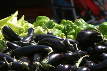 Black Aubergines and Green Peppers