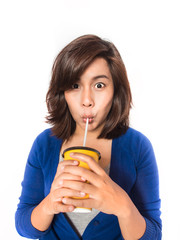 Beautiful young  woman drinking in yellow paper cup with straw o