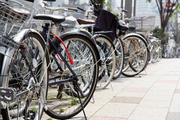 Obraz na płótnie Canvas Lot of Bicycles parking at Tokyo, Japan