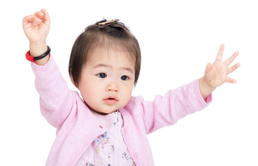 Asian baby girl hands up