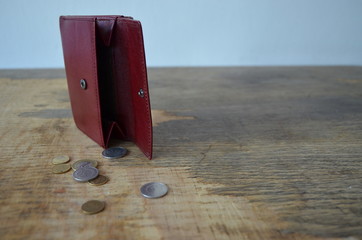 Burgundy, a little battered wallet