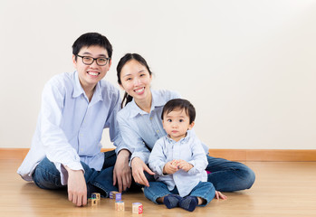 Family smiling at home