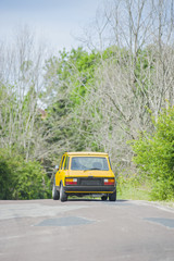 Yellow compact car