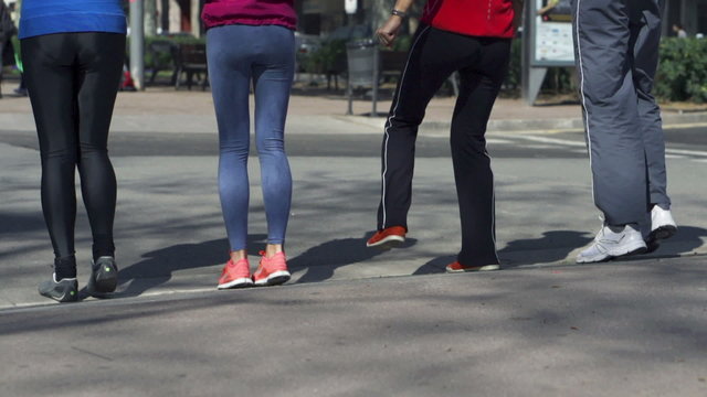 Group of people jogging in the city, slow motion shot at 240fps,