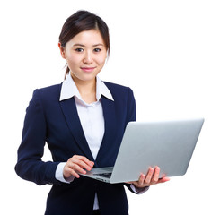 Businesswoman with laptop computer