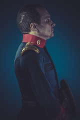 Honor,  general of the Spanish army, blue coat and gold epaulett