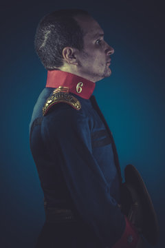 Honor,  general of the Spanish army, blue coat and gold epaulett