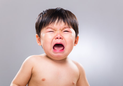 Crying asian baby