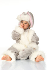 Cute baby wearing bunny costume