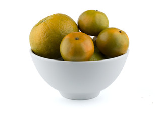 Oranges in white bowl