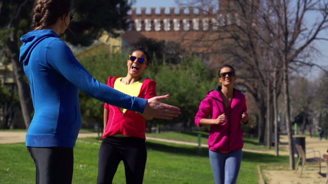Joggers finish racing in park, slow motion shot at 240fps, stead