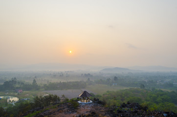 Obraz na płótnie Canvas Sunrise over the hills that stretch with pavilion, Nakhonnayok Thailand
