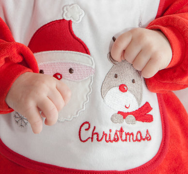 Baby als Weihnachtsmann