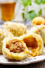 Apricot in pastry, popular austrian dish. Garden party table