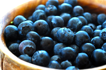 Ripe blueberries in a bowl.