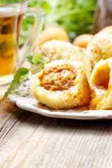 Apricot in pastry, popular austrian dish. Garden party table