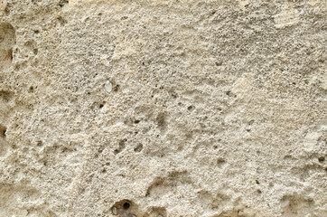 Weathered old sandstone wall background