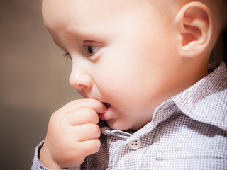 Cute baby boy eating something