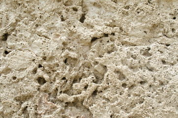 Weathered old sandstone wall background