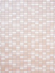 tiled wall of brown and beige