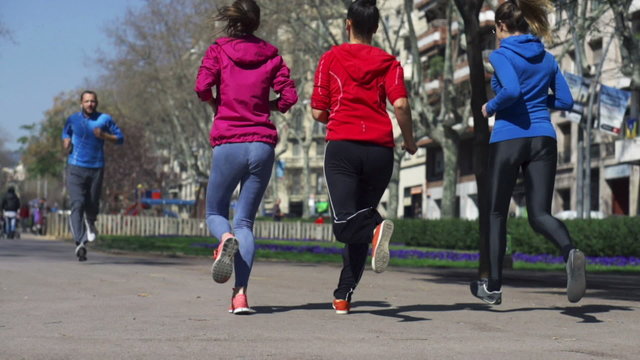 People jogging in the city, slow motion shot at 240fps, steadyca