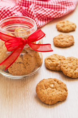 Butter cookies and bottle on table