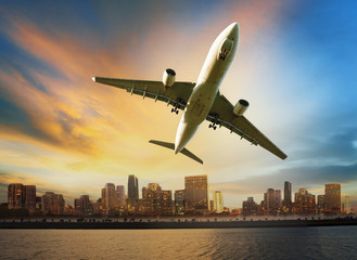 passenger plane flying above urban scene use for convenience air