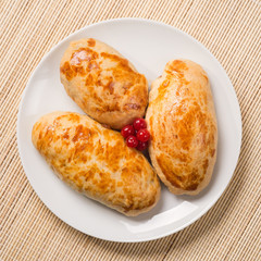 Pies with apple butter and lingonberry berries