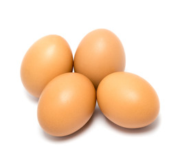 Fresh brown eggs  on  white background