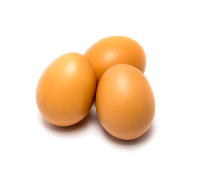 Fresh brown eggs  on  white background.