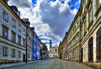 Street of the old town in Warsaw. Street Mostowa