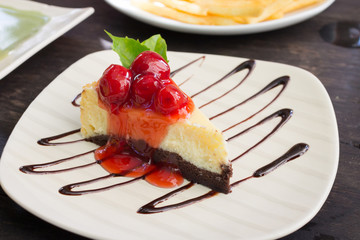 Dessert - Cheesecake with Berries Sauce and Green Mint