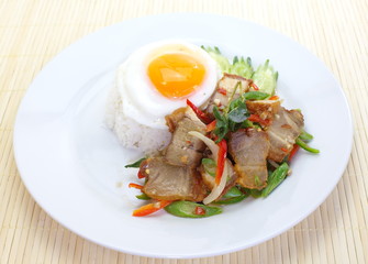 fried basil leaf with crispy pork and rice