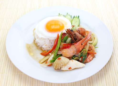 fried basil leaf with seafood and rice