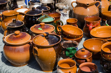 clay pots cups various sizes shapes on fair stall