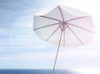 white umbrella on the sea landscape