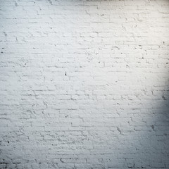 White brick wall wit spotlights