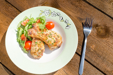 Grilled chicken drumstick with vegetable