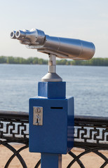 Coin operated binocular on the bank of river