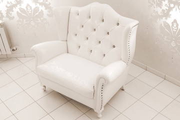 white leather armchair
