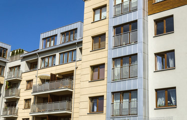 Modern and new apartment building against blue sky