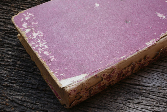 old book on a wooden background