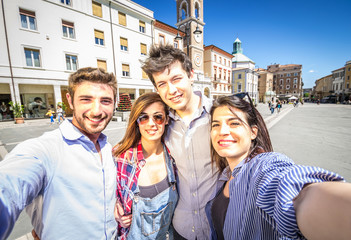 Friends taking photo of themselves