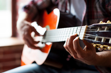 Man playing guitar.