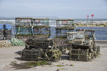 Crab and lobster pots on the quay at Mudeford Dorset England