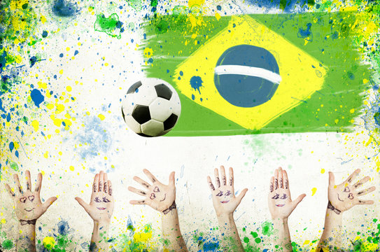 Cheering hands, soccer ball and colors of Brazil