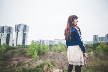 beautiful woman in a desolate landscape