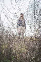 beautiful woman in a desolate landscape