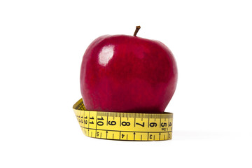 apple with tape measure, concept of healthy eating, lifestyle
