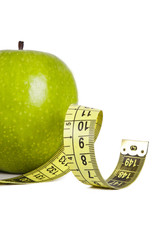 apple with tape measure, concept of healthy eating, lifestyle